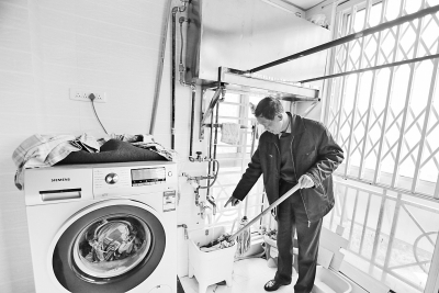 鄭州退休工程師發明節水“神器” 洗衣水一水三用